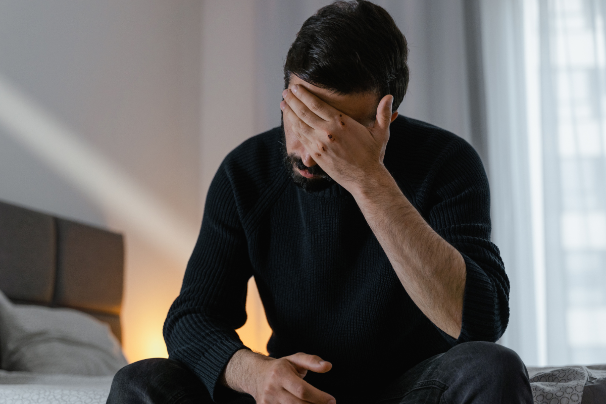 man stressed bedroom, erectile dysfunction concept, candle extinguished